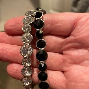 2 bracelets cubic zirconia and black stone. Stretchable.